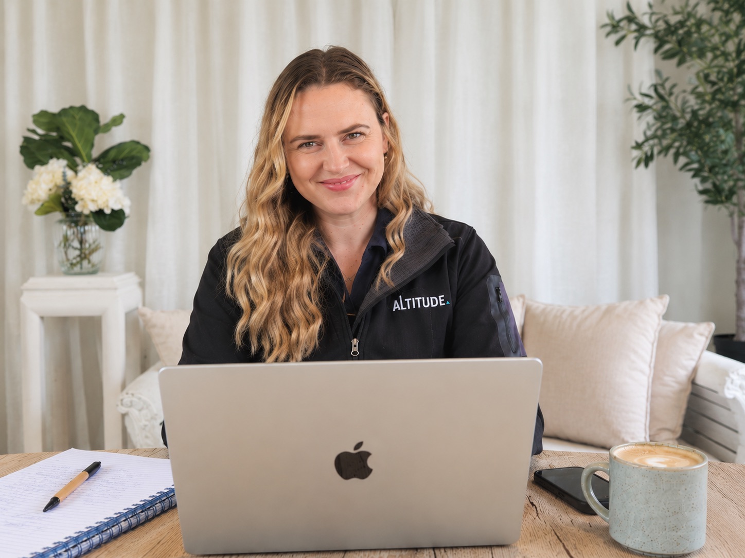Chelsea Sinnamon, founder of Altitude Marketing, at her desk